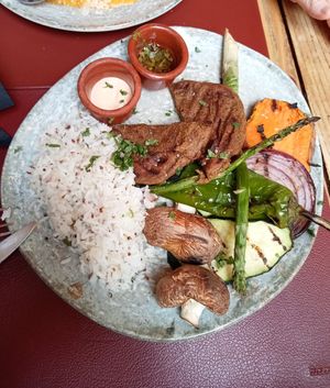 Filetes de lentejas con chimichurri con acompañamiento de arroz y verduras al grill at Andino Gastrobar in Malaga