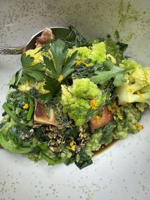 Steel cut oats with herbs and greens —recommended  at abcV in New York City