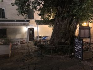 The outdoor dining area courtyard  at Ombra Restaurant in Kotor
