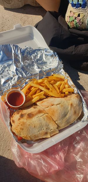 Vegan sandwich with vegan cheese, grilled veg and chips. at Ombra Restaurant in Kotor