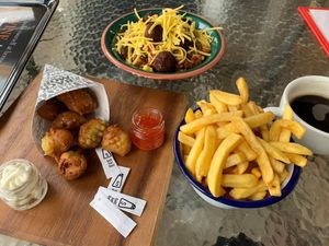 Vegan popcorn chickn with chips and pasta with mushroom meatballs!!  at The Retreat Animal Rescue Farm Sanctuary and Cafe in Ashford