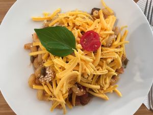 Vegan glutenfree pasta w/ tomato&zucchini sauce and vegan cheese at Madal Food in Budapest