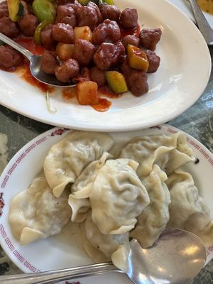 Sweet & Sour Soy Protein with Bell Peppers, Cucumber, and Pineapple and Homemade Vegetable Dumplings  at Jyun Kang Vegetarian Restaurant in Ukiah