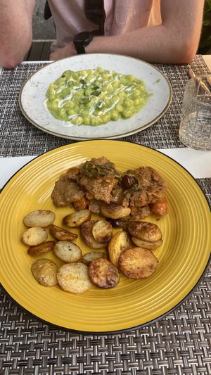 Home made gnocchi, zucchini sauce, mint and vegan Gorgonzola cheese… absolutely incredible, such a unique dish! Vegan chicken, pepper, onion, olives & roast potato… so cosy!  at L'OV Osteria Vegetariana in Florence