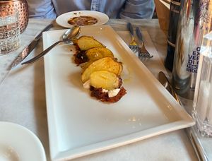 Potatoes with vegan Salami and ricotta  at L'OV Osteria Vegetariana in Florence