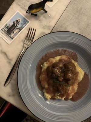 Vegan sausage with potato, chestnut and wine sauce   at L'OV Osteria Vegetariana in Florence