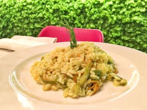 Riso ‘Vialone Nano’ ai Fiori di Zucca e Zafferano mantecato all’olio di oliva at L'OV Osteria Vegetariana in Florence
