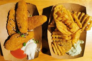fried chicken tenders with sauce // potato waffles with basil mayo at Veg Machine in Tallinn