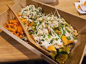 "Tṣ̌ik'n Salad" with mycoprotein, quinoa, spicy cucumber, carrot, tofu "cottage cheese", tomato, teriyaki, sprouts, ceasar sauce, sesame seeds (10.2€) at Veg Machine in Tallinn