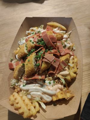 Loaded fries with chicken tenders and bacon at Veg Machine in Tallinn