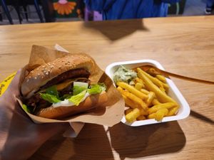 Smash burger and fries with sauce. at Veg Machine in Tallinn