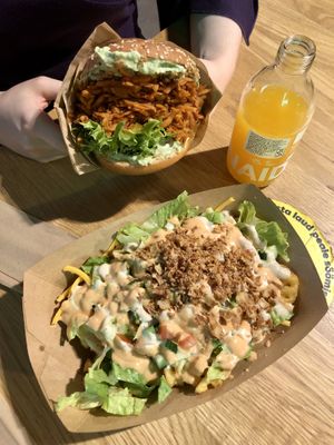Mother Trucker Burger, Loaded Fries, and Passionfruit Lemonade   at Veg Machine in Tallinn