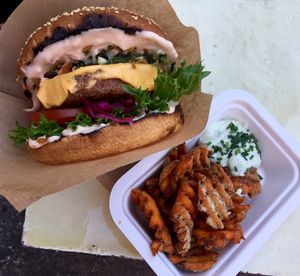 Cheese Burger with a Beyond Meat patty and sweet potato waffles on the side. All vegan. at Veg Machine in Tallinn