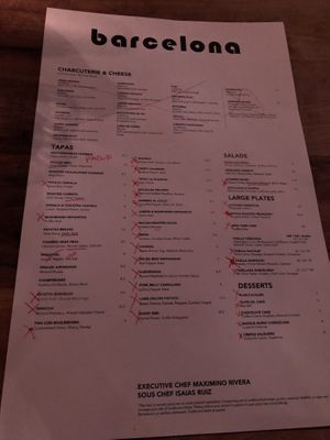 Menu - marked up by server. Anything that does not have red, is vegan or can be made vegan   at Barcelona Wine Bar in Stamford