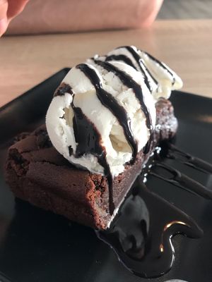 Vegan brownie with vegan ice cream  at Cervecería Passion in Gran Canaria