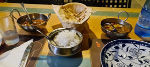 Curries, rice and garlic naan at Curry Park in Crete