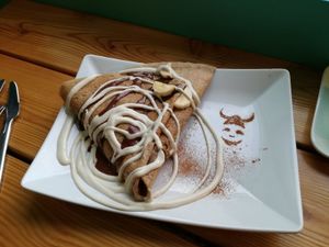 The tastiest crepe ever - banana filling with cashew cream and chocolate topping.  Perfection! at Joylato in Reykjavik