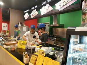 Staff making burritos at Wrap Master - Nimmanhemin in Chiang Mai
