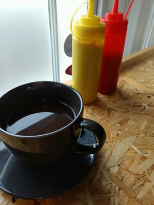 black coffee and ketchup  at Grumpy Panda Slice Shop & Deli in Gateshead