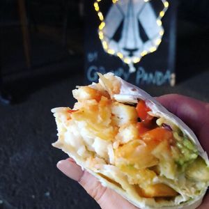 Burrito with chips at HWKRMRKT at Grumpy Panda Slice Shop & Deli in Gateshead