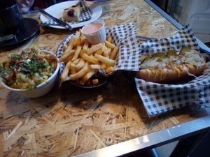 Traditional Hot dog with Fries & Mac & cheese. at Grumpy Panda Slice Shop & Deli in Gateshead