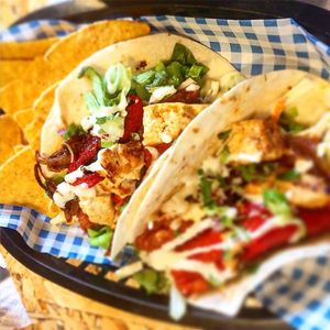 Soft tacos with spicy tofu at Grumpy Panda Slice Shop & Deli in Gateshead