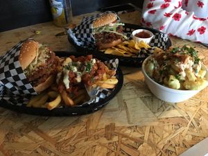 Burgers with dirty fries and mac and cheeze at Grumpy Panda Slice Shop & Deli in Gateshead