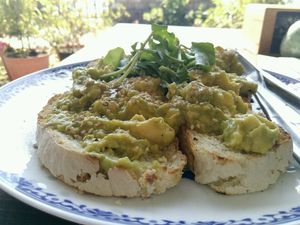 avocado on toast with greens at The Juicery Cafe in Pokhara