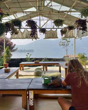 Relaxed seating area of juicery with enchanting lake views.  at The Juicery Cafe in Pokhara