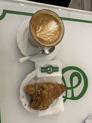 Coffee with soy milk and croissant with jam  at Dolce Pisa in Pisa