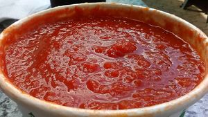 A vegan Classic Tomato soup special from Taste Budd's. Covid-19 era to-go packaging.  at Taste Budd's Cafe in Red Hook