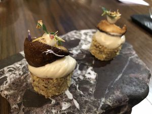 Amuse-bouche: Polenta with shiitake mushroom at Officina Verde in Riva Del Garda