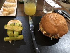 Homemade Seitan burger with fries and homemade mayo. at Officina Verde in Riva Del Garda