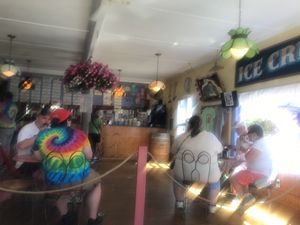 Inside of restaurant with a few tables at Ice Cream Factory in Boothbay Harbor
