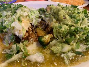Full of grilled broccoli, mushrooms, peppers, grilled onions, carrots and zucchini cooked perfectly. There was rice in it but not “too much rice”. On top-lettuce, guac, & verde at Ay Caramba Tres Amigos in Wenatchee