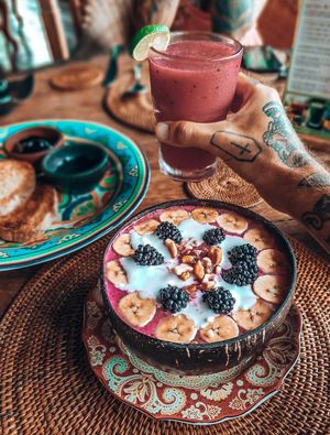 Breakfast option if you stay with us. Smoothie bowl and fresh fruit juice.  at Sarinbuana Eco Lodge Restaurant in Tabanan
