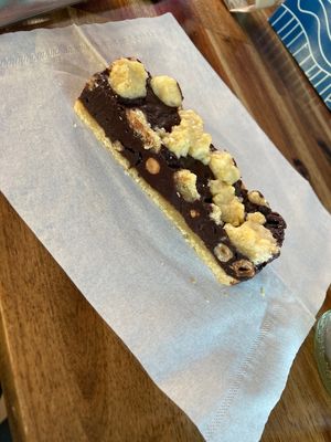 Hazelnut chocolate slice 🌱  at Let Them Eat Vegan in Dunedin