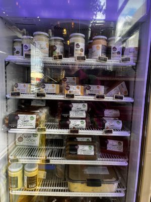 the stash of spreads, cheeses, and meats for sale   at Let Them Eat Vegan in Dunedin