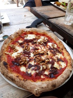 Goats cheese,red onion and walnut pizza at Tarifa EcoCenter in Tarifa
