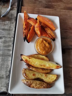 Potatoes and sweet potatoes with salsa brava at Tarifa EcoCenter in Tarifa