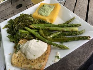 Pepper encrusted tofu with polenta and avocado mousse, kale, and asparagus.  at Garden Cafe of Woodstock in Woodstock