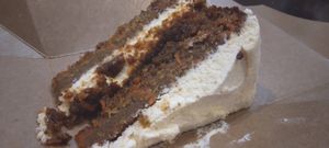 Carrot cake with pecan praline and coconut filling (takeout) at Garden Cafe of Woodstock in Woodstock