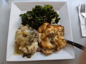 Cauliflower steak with garlic aioli, mashed potatoes, sauteed greens at Garden Cafe of Woodstock in Woodstock