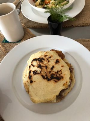 Arepa with mushroom paty, plátano, and olive oil at Sat Nam in Antigua
