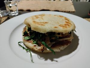 Arepa filled with peanut sauce, mushrooms and more at Sat Nam in Antigua