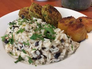 Arroz con champiñones y aceitunas negras, croquetas de lentejas y plátano  at Sat Nam in Antigua