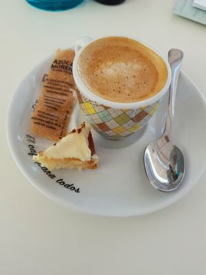 coffe with oat milk and small vegan sweet at V-Thos in Javea