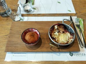 Melanzane alla parmigiana e arancino siciliano at Essenza in Grosseto