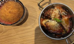 Parmigiana e arancino  at Essenza in Grosseto