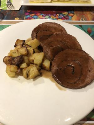 Seitan and roasted potatoes   at Essenza in Grosseto